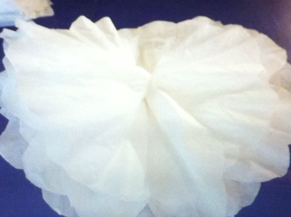 Open the flower and flatten it as you can. It will be lumpy.