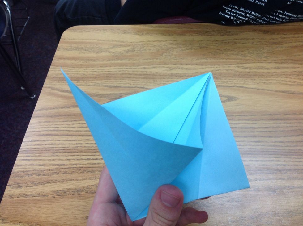 Open the fold as shown.