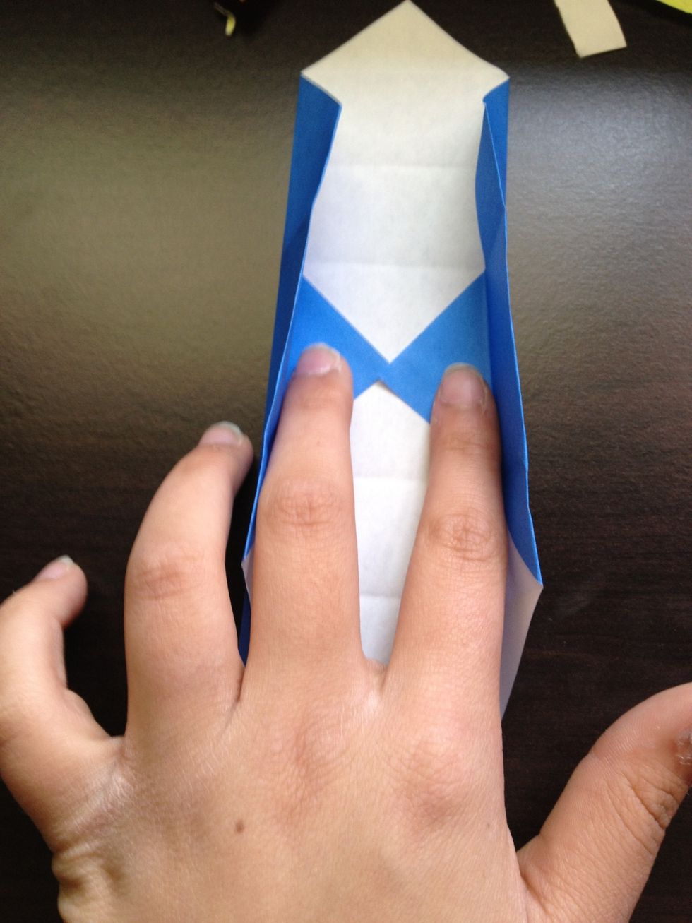 Open the folds you just made. These are 2 of the sides of your box.