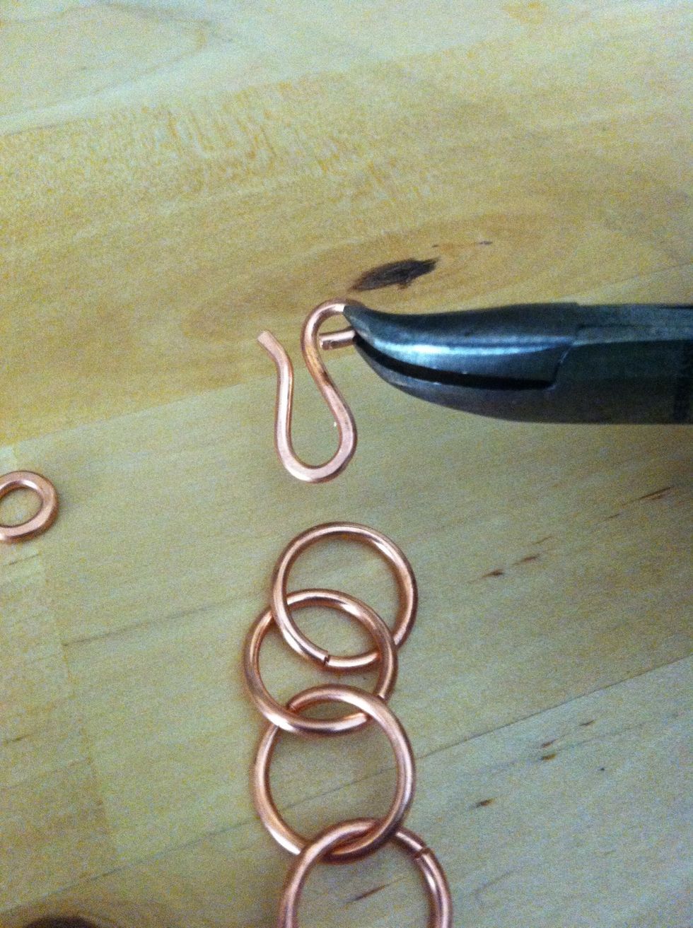 Open the loop on the hook to the side and loop it on your chosen piece of jewelry. Pictured is the chain from my "Make Jump Rings & Chain" Snapguide.