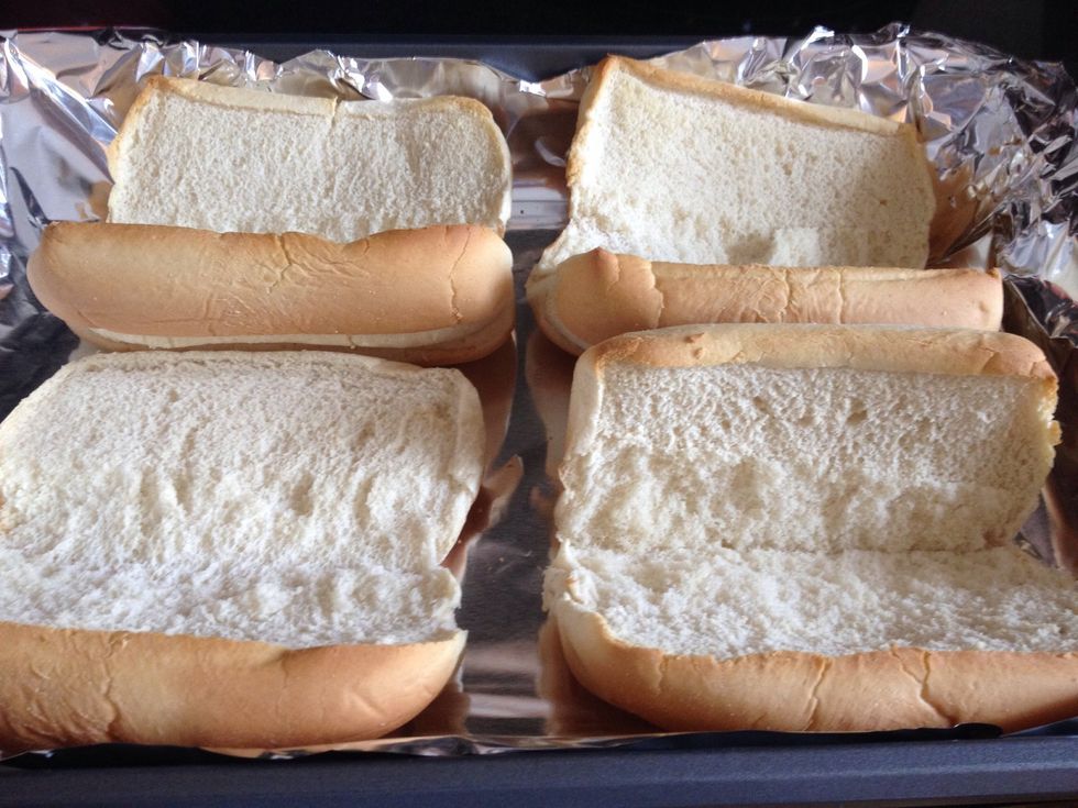 Open the mini subs, put on cookie sheet, add to 400 degree oven, and allow bread to toast. I took mine out after about 10 minutes. Will be slightly browned on edges.