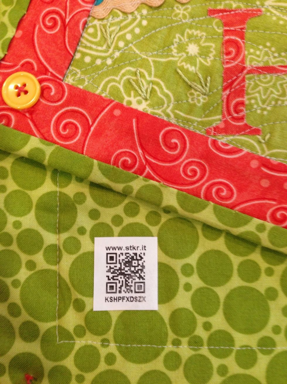 Open the package and follow the directions to either iron or sew on your label. I chose the iron on label.