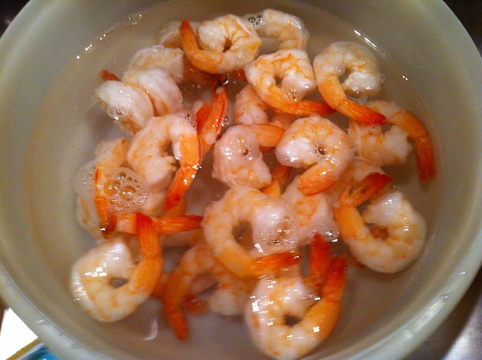 Open the package for frozen shrimp, and let them stay in the water. Water has to be cold.