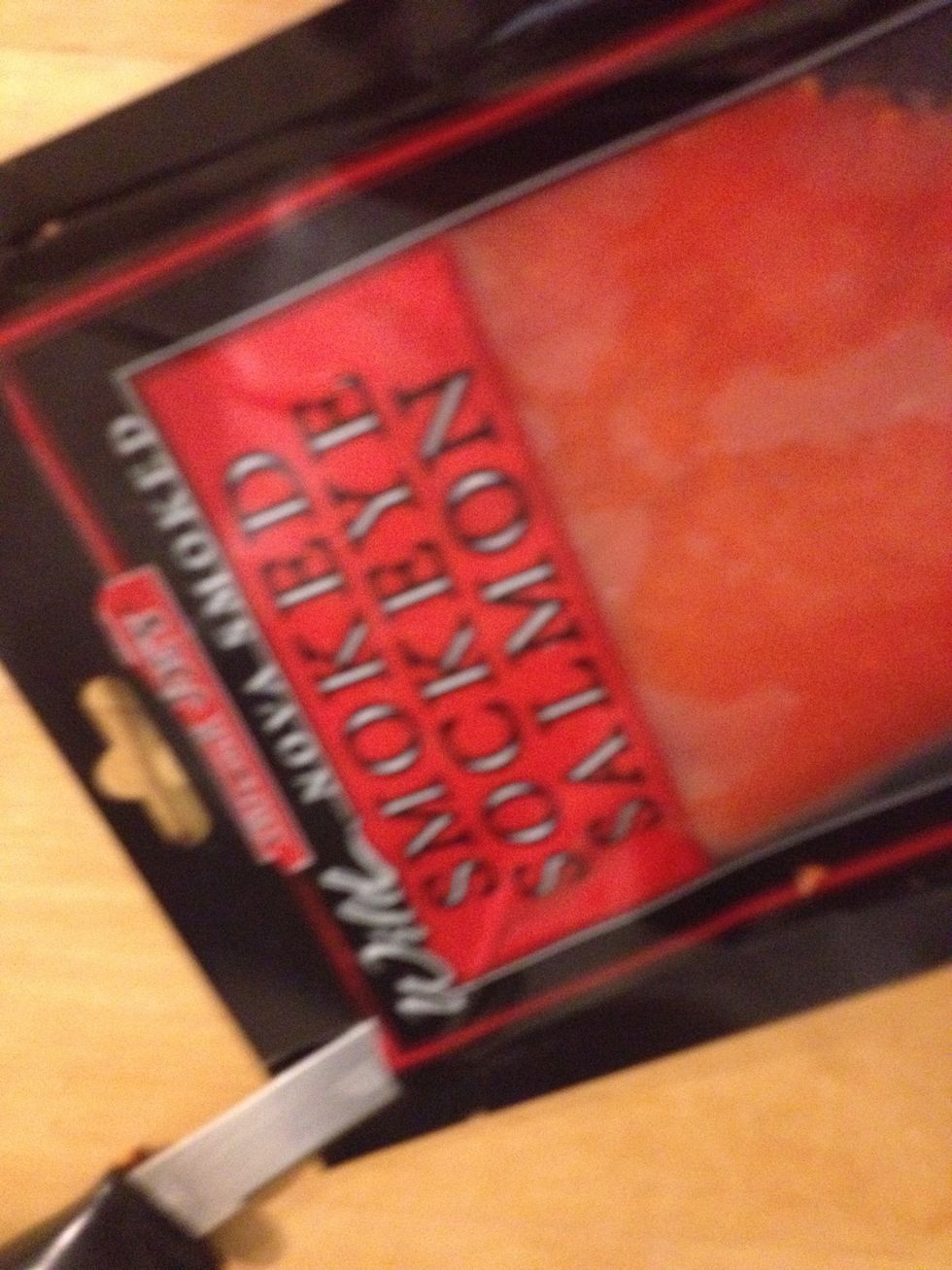 Open the package of smoked salmon. (Sorry the photo is out of focus. Ever try using a knife in one hand and a camera in the other?!)