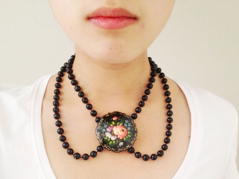 Open the pin on the back of the brooch and use it to carefully clip the two ends of the necklace together. And that's it~ vintage chic!