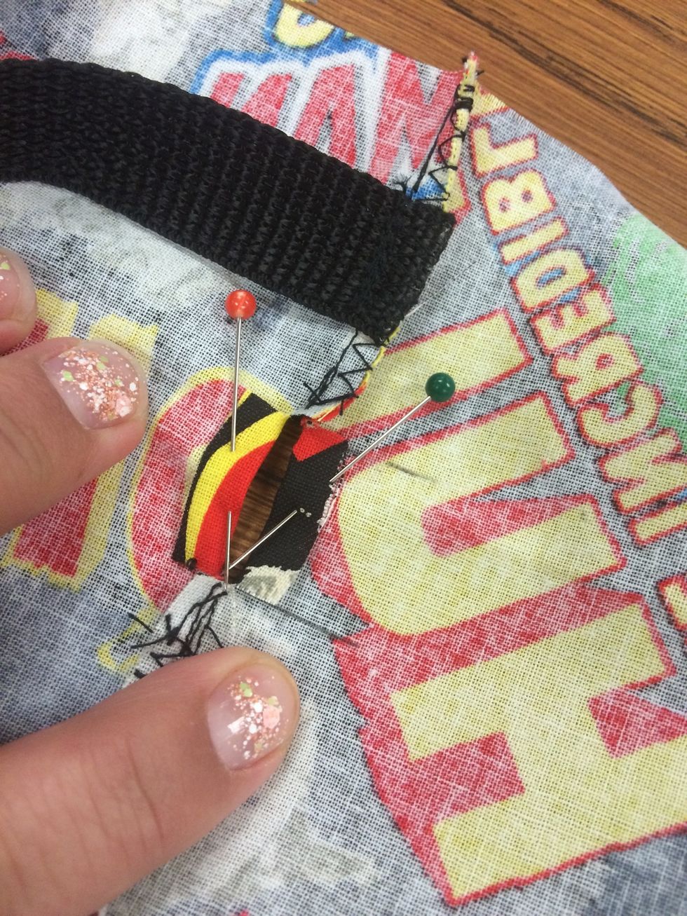 Open the seam from the inside of the bag. Pin each side so they stay open as shown. )you will be sewing around this opening for your straps to go through!)