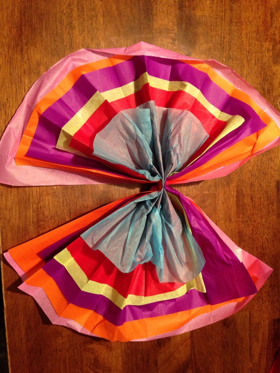 Open the tissue paper accordion.