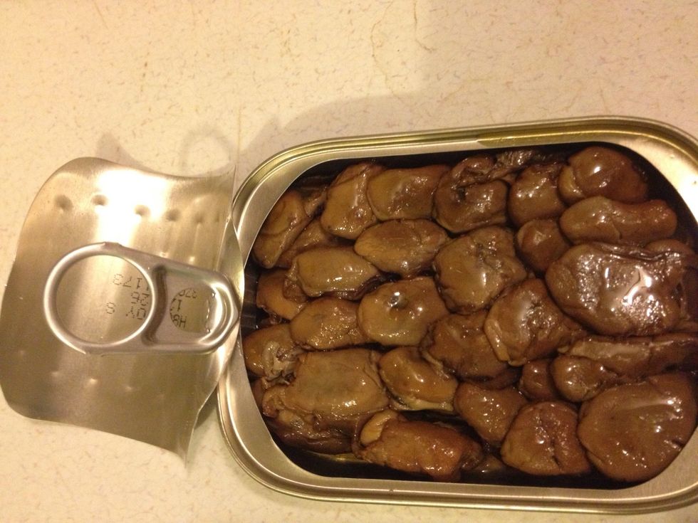 Open the top a little and drain the oil. Then take the lid off.