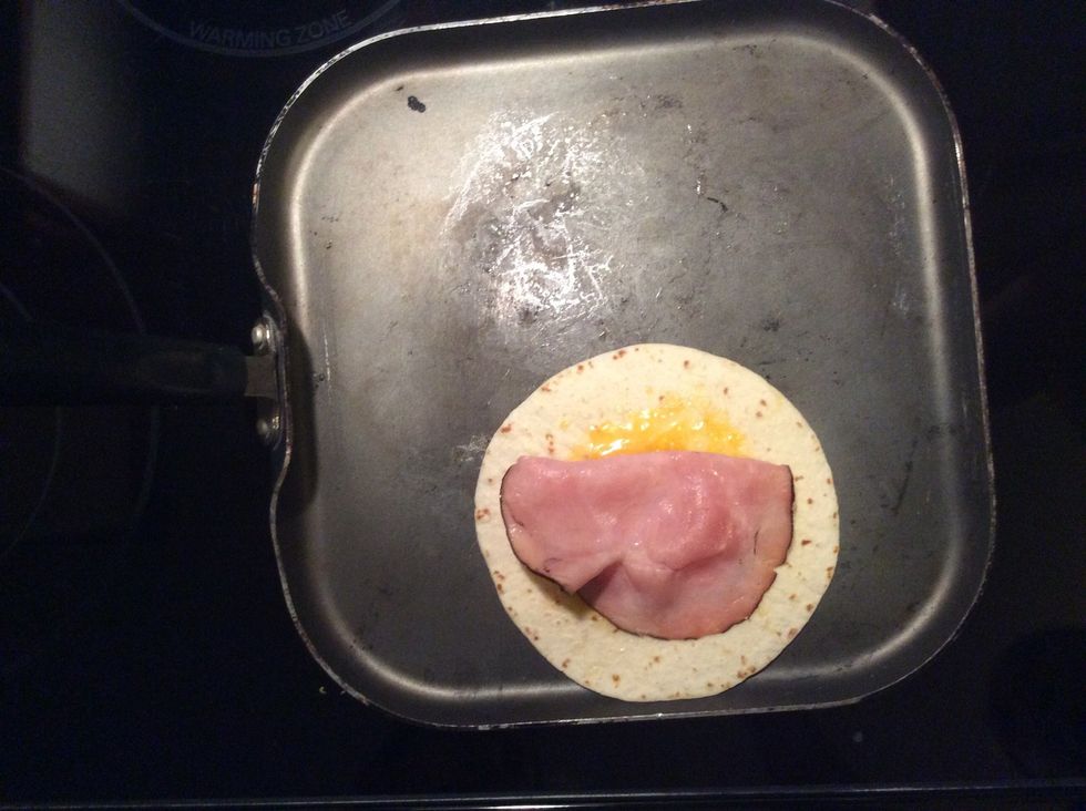 Open the tortilla and then put him on the tortilla