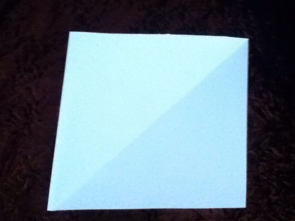 Open the triangle that you cut of and open it to make a square