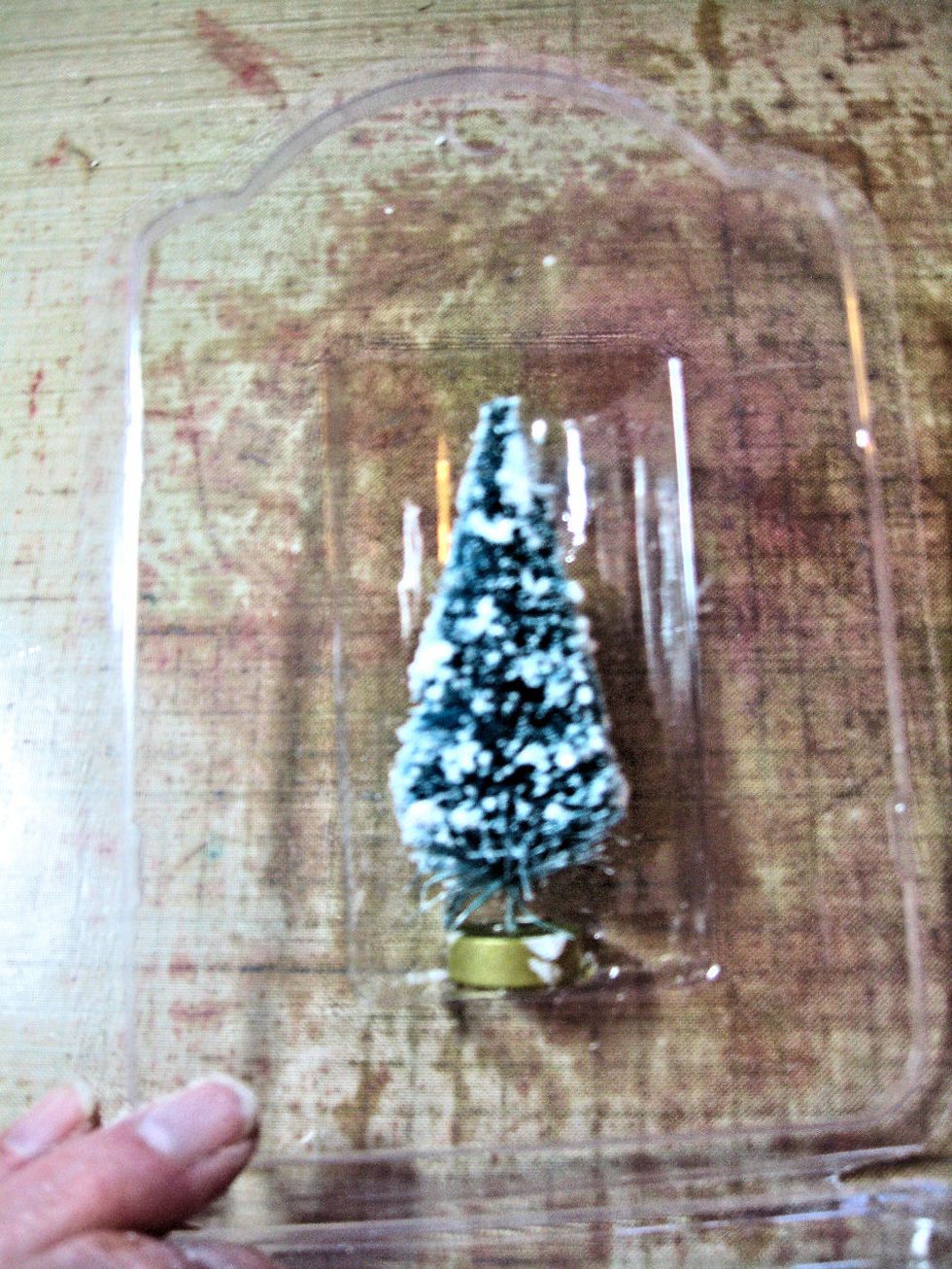 Open the washi tape packaging and glue the tree in place. I used hot glue.