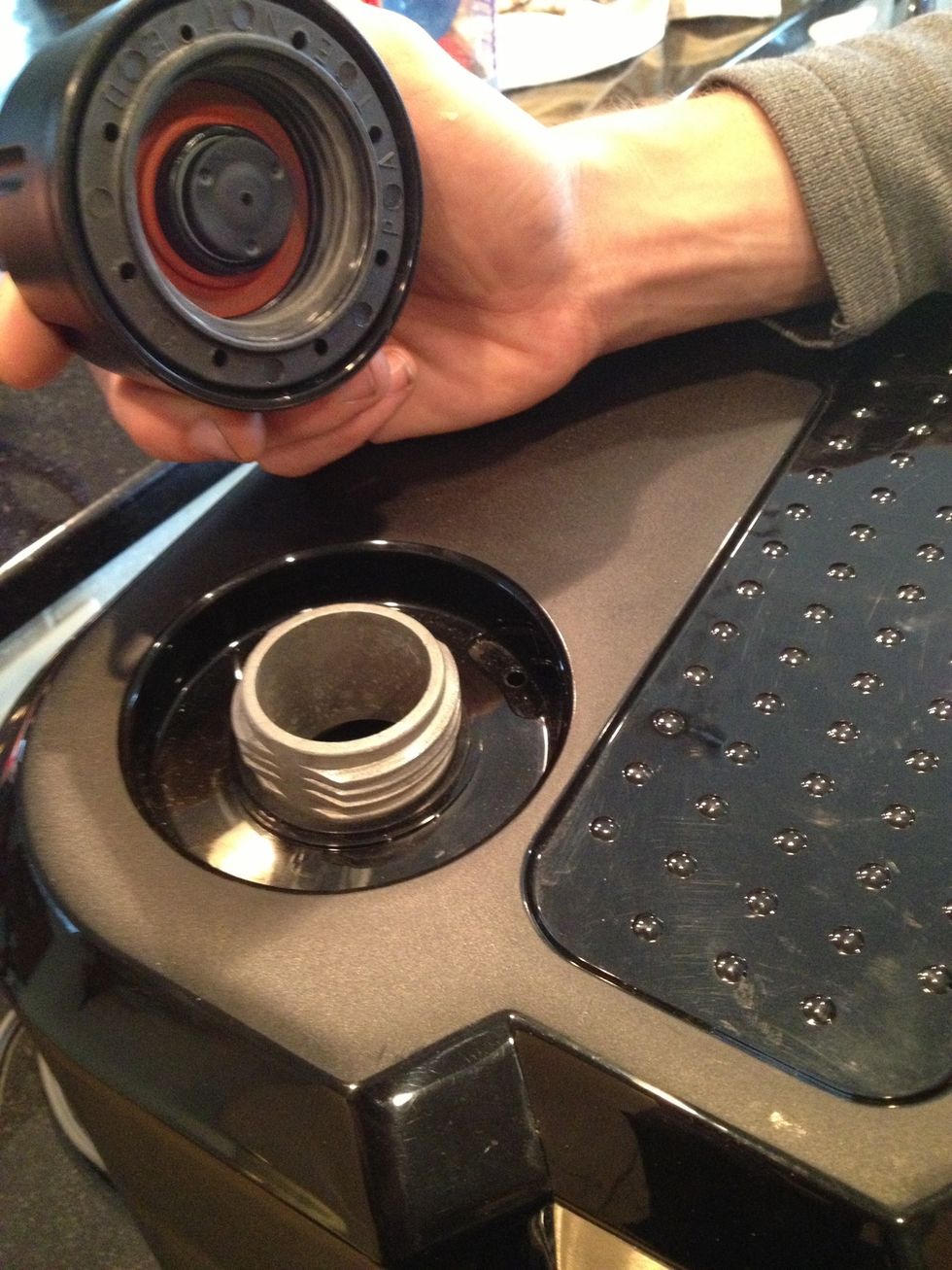 Open top of espresso machine