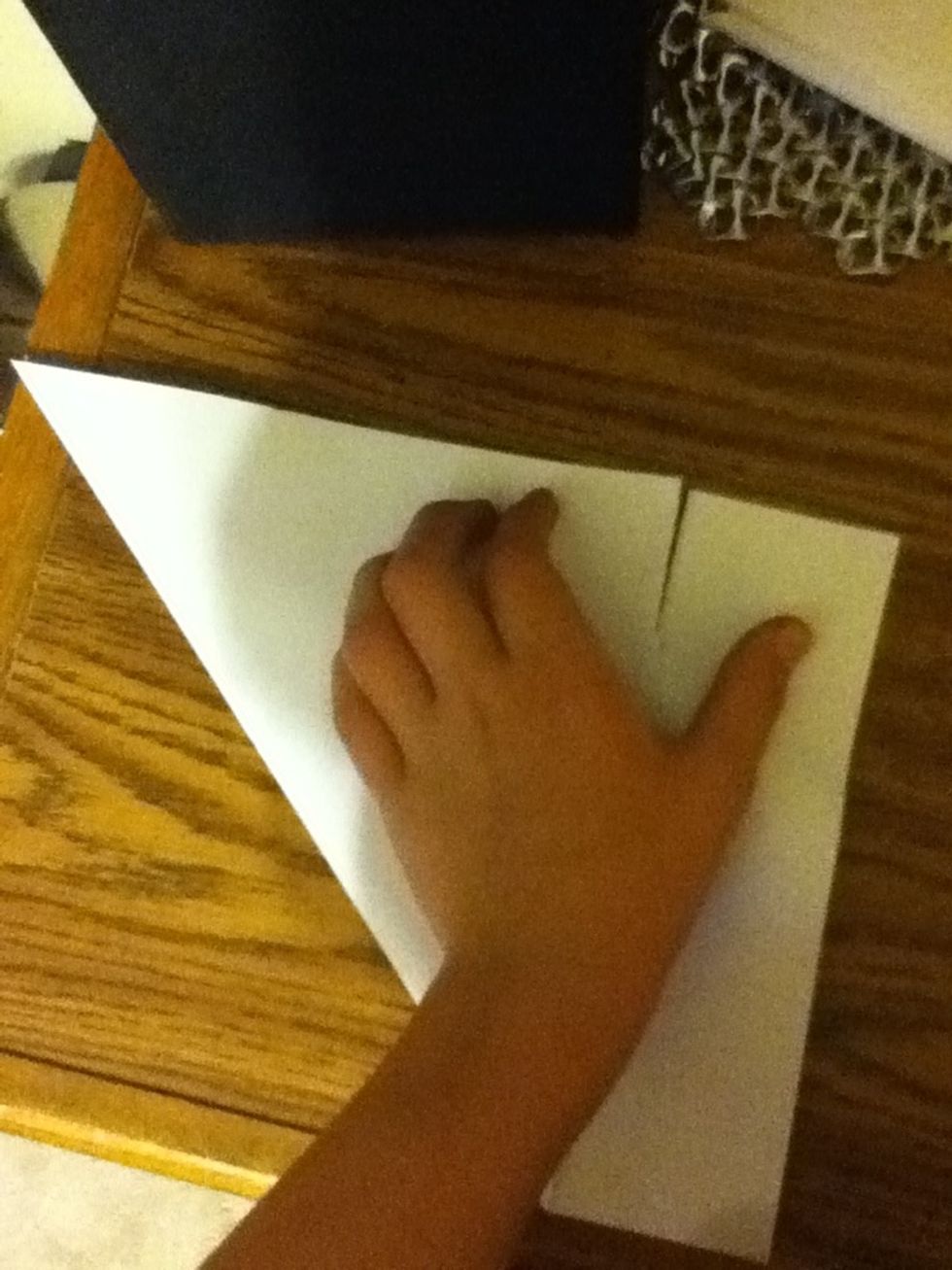 Open up and rip along the fold.