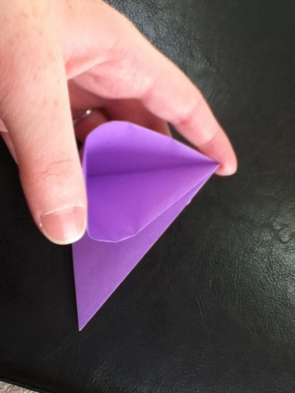 Open up one side for a squash fold.