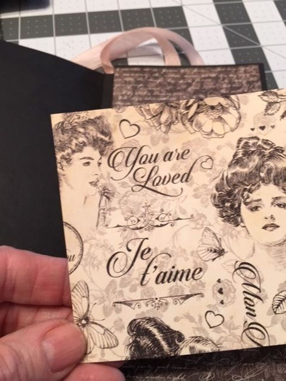 Open up the booklet. For the left side, cut from Precious One, 1@ 3 5/8" wide x 4" tall, ink edges and glue into top half above the pocket.