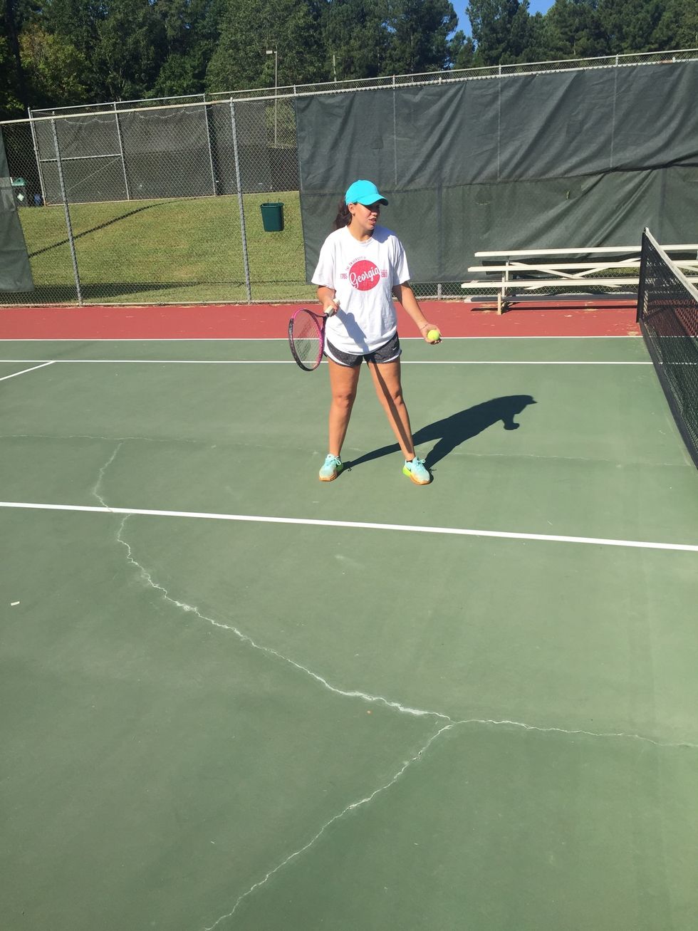 Open up to receive the ball, step back with your dominant foot behind you and open your body to the ball. start your racquet slightly behind you to start your follow through to hit the ball