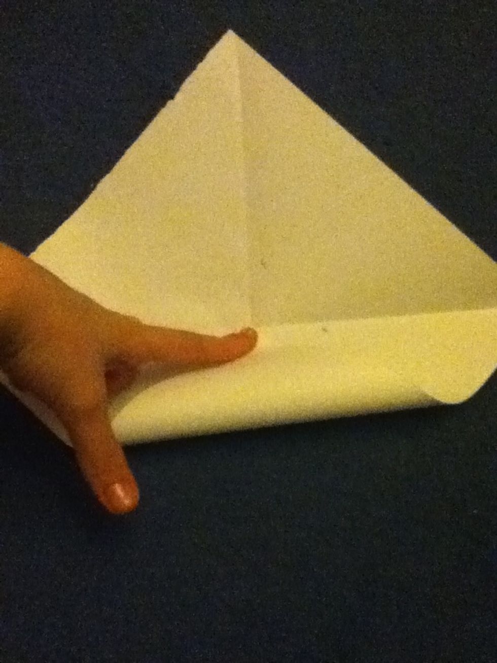 Open up your sheet of paper and fold all the corners into the center