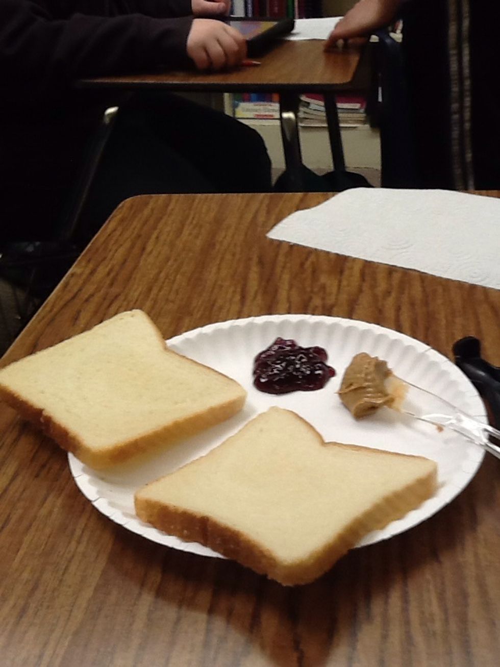 Open up your slices of bread and place them down on your plate.