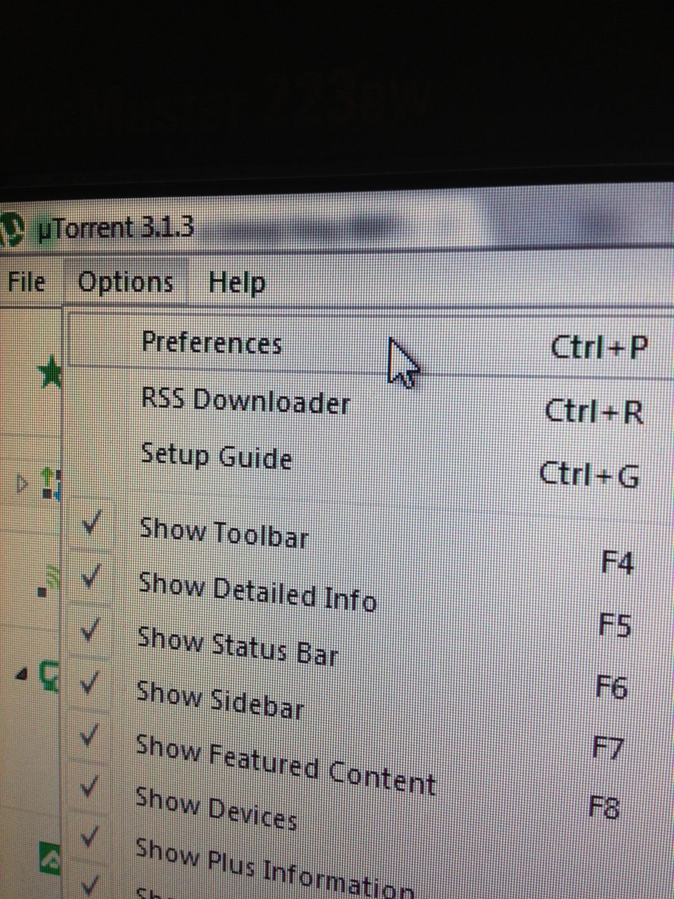 Open uTorrent, click Options>Preferences.