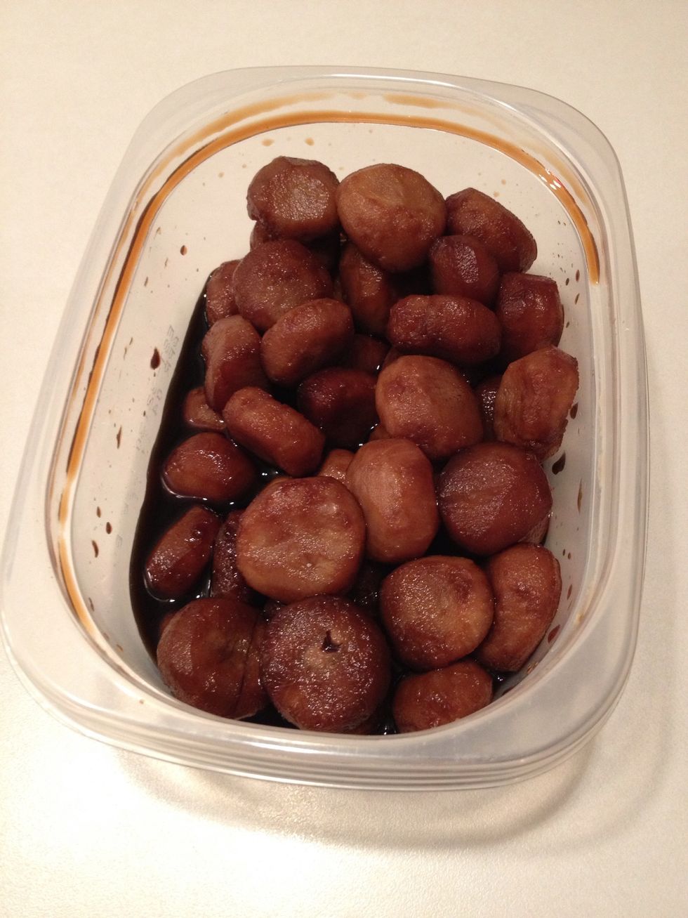 Open water chestnut can. Drain water. Add chestnuts to a container with a snug lid or a ziplock back. Pour soy sauce over chestnuts.