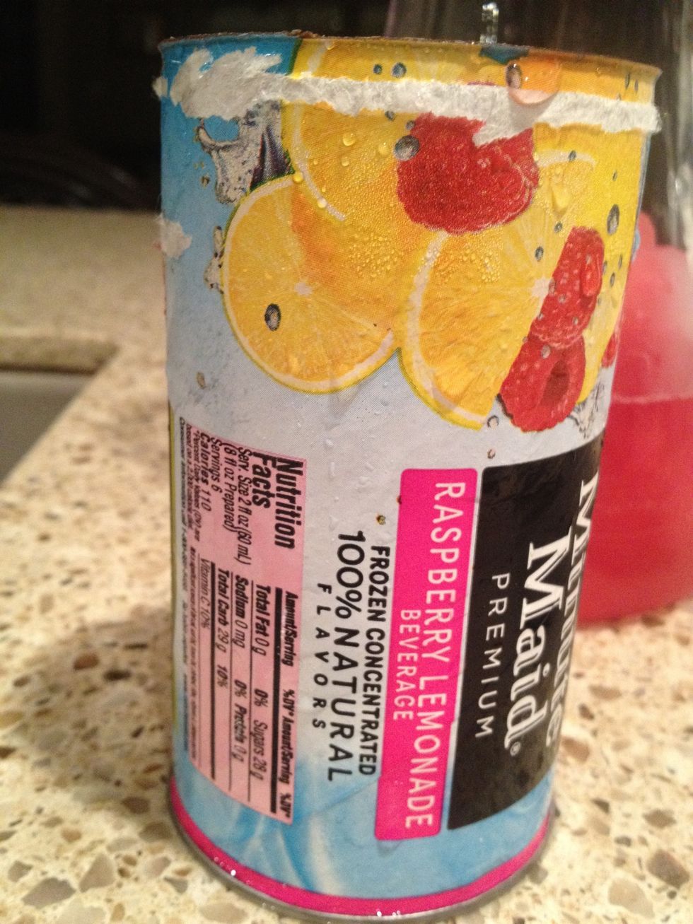 Open your can of frozen limeade mix and pour it into a pitcher. We used raspberry this time, but plain limeade is awesome!