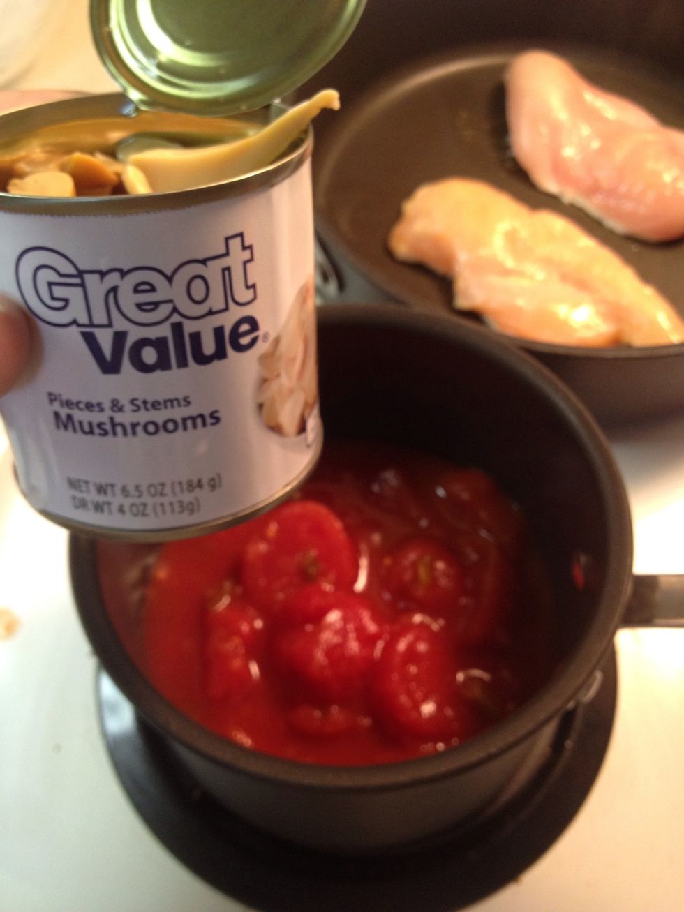 Open your can of mushroom stems and pieces slightly to drain the juices. Then dump the mushrooms in the sauce pan.