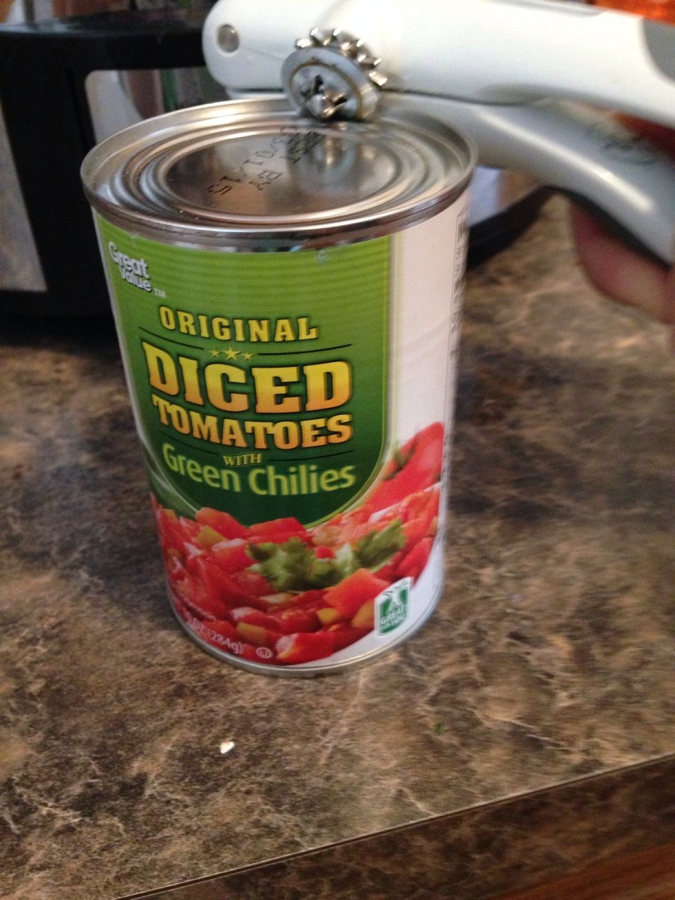 Open your canned tomatoes and green chili.