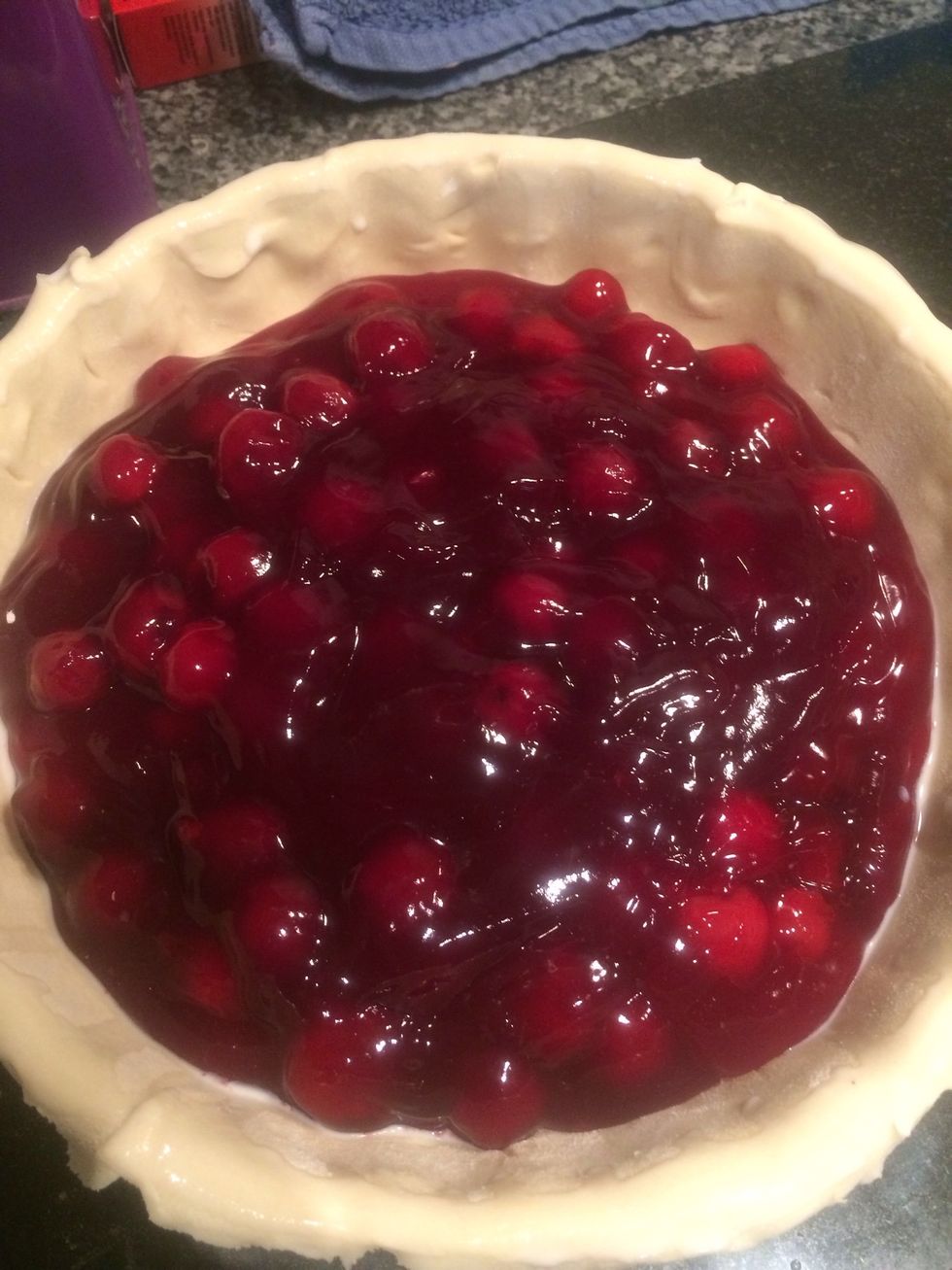 Open your cans of pie filling and pour them in. I find one tin is just not enough so two it is!!!