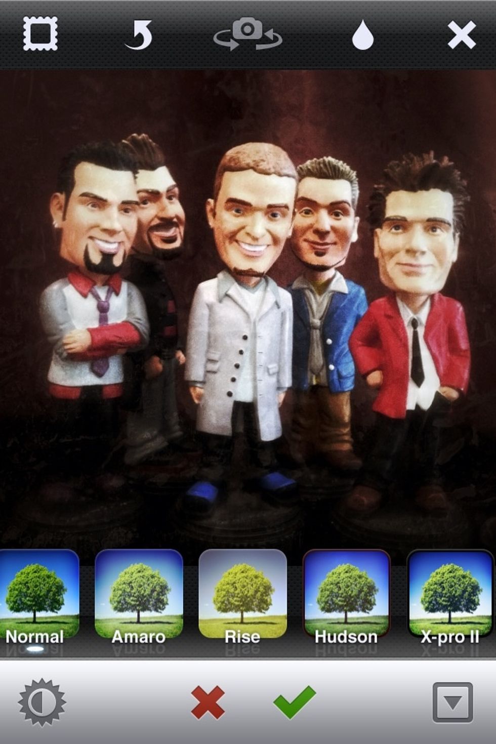 Open your enhanced image in Instagram. Experiment with Instagram filters. Image frame that's accompanies most filter can be toggled on an off, by selecting the frame icon at the top of the screen.