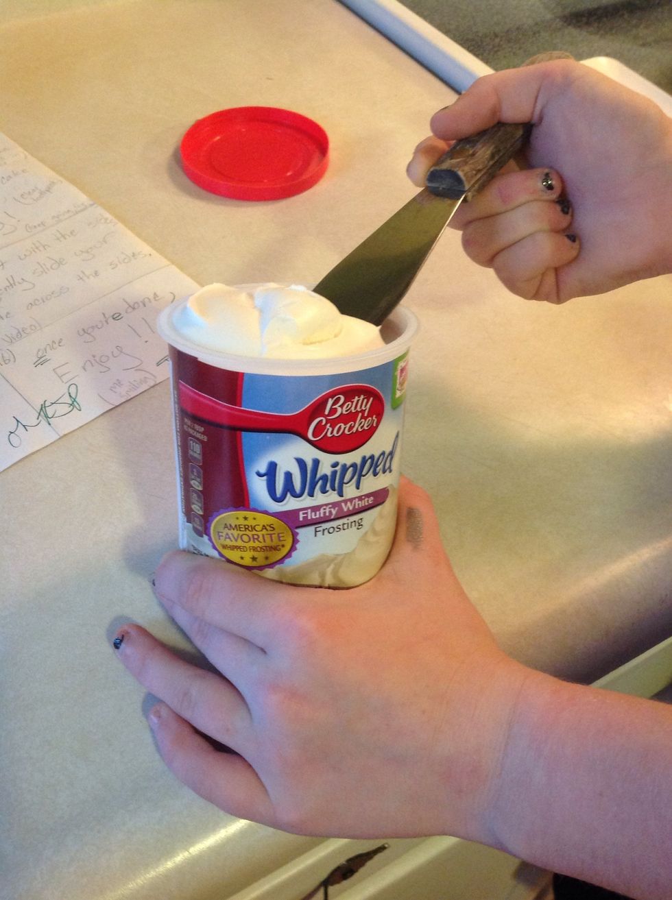 Open your frosting and get some on the spatula
