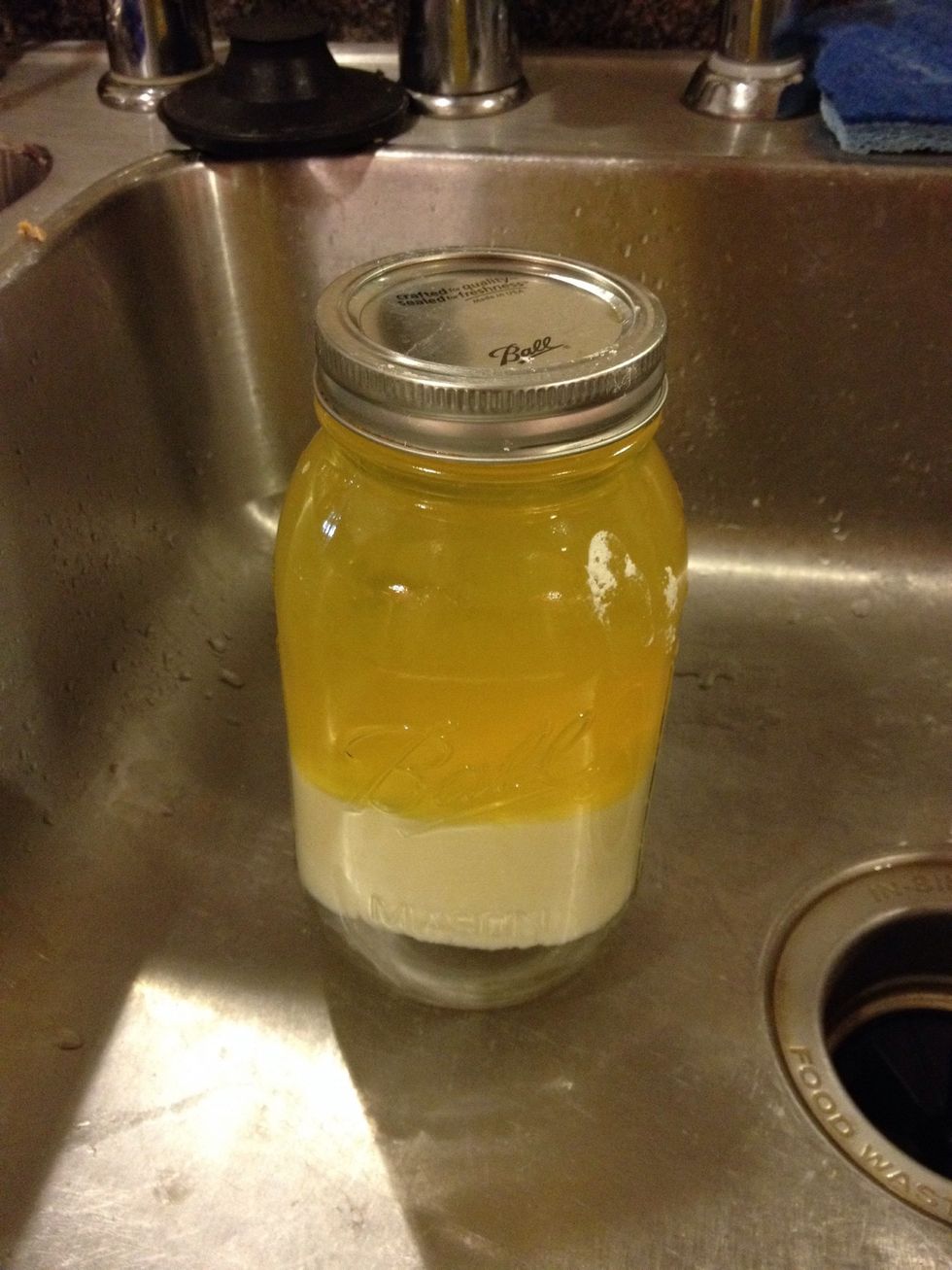 Open your jar. Because of the tightness of the lid and the temperature of the mixture, you may find that your lids have vacuum sealed themselves.