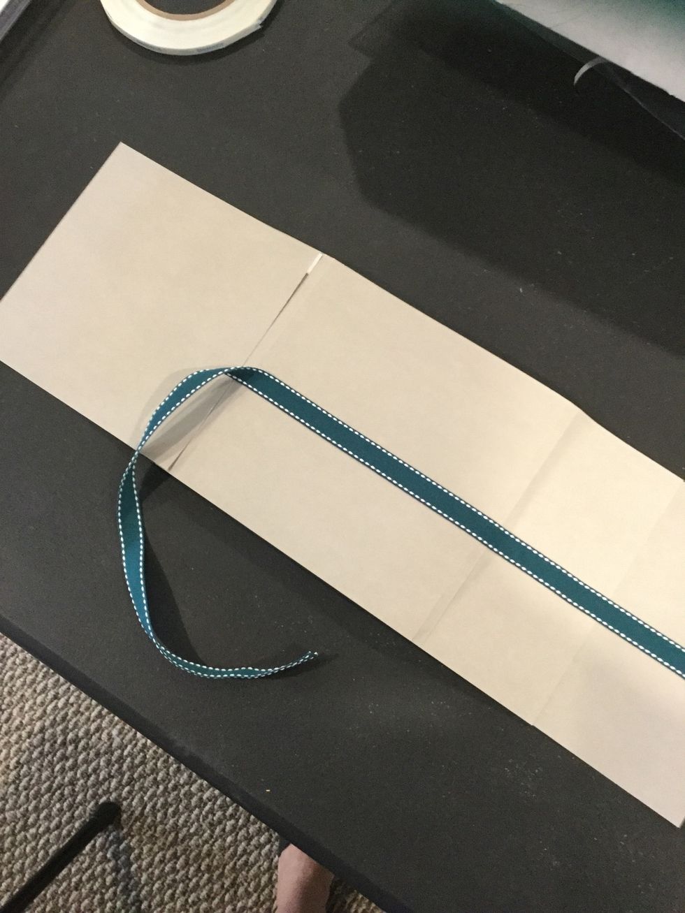 Optional. Add a 33 inch ribbon as shown!  Do not attach to the front cover.