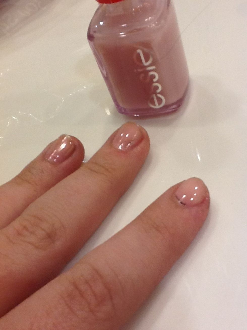 *optional* Add a base coat~ this is Essie's 'grow stronger'