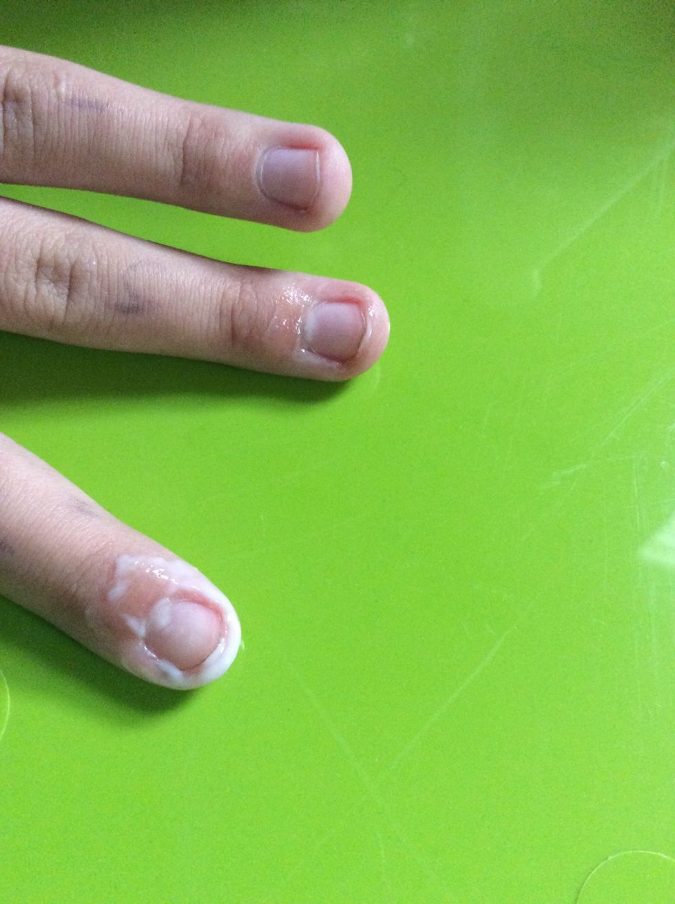Optional coat around your nails with glue to peel of all unwanted nail polish