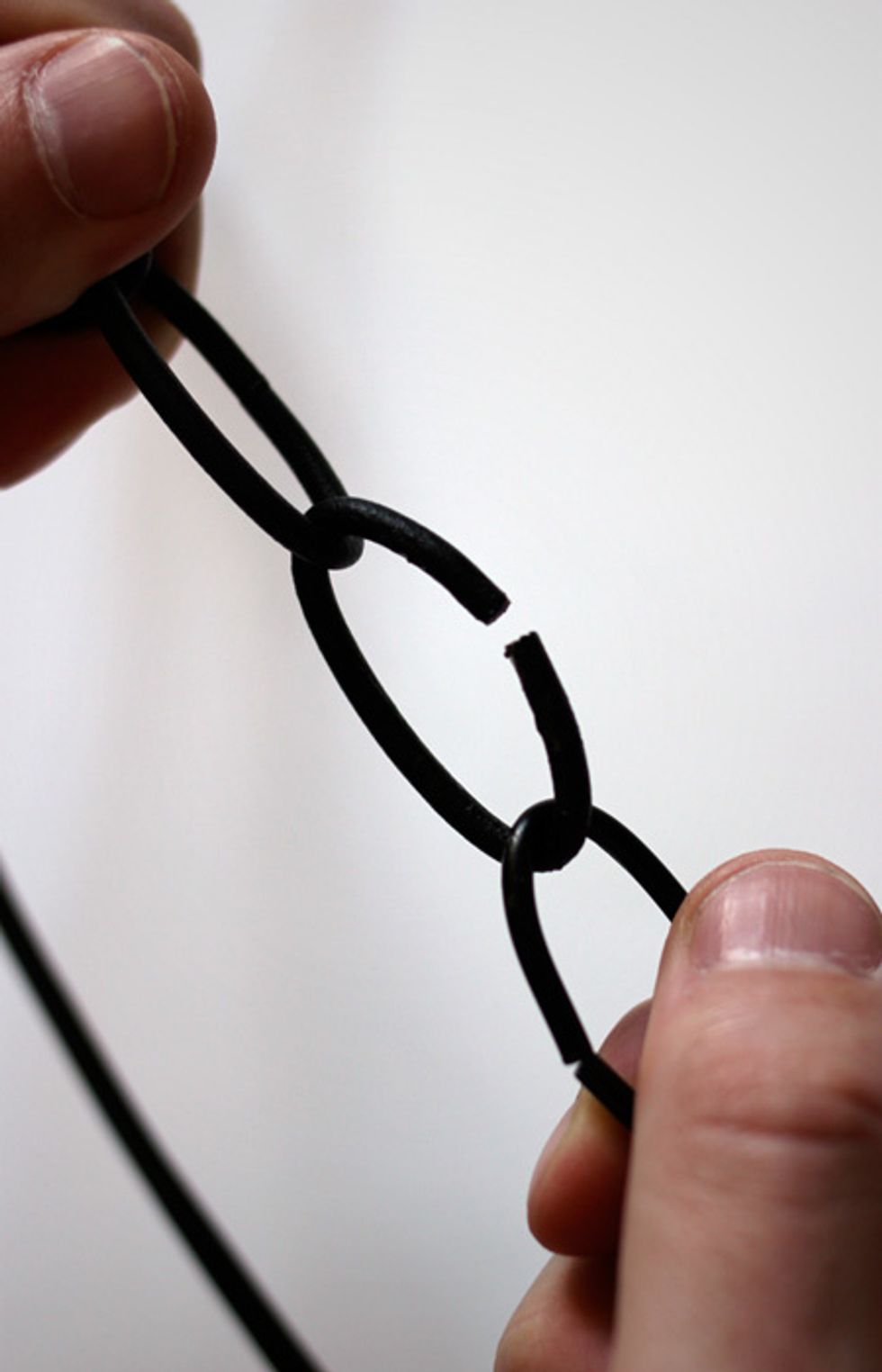 *OPTIONAL* Depending on your intended location you may want to add chain to conceal any exposed or hanging cord. Use pliers to open a link and attach the extra length to the lantern.