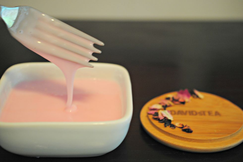 (Optional glaze) While your cookies are cooling, mix a small amount of water with the icing sugar until you have a spreadable glaze. I added one drop of red food colouring to make my glaze pink.