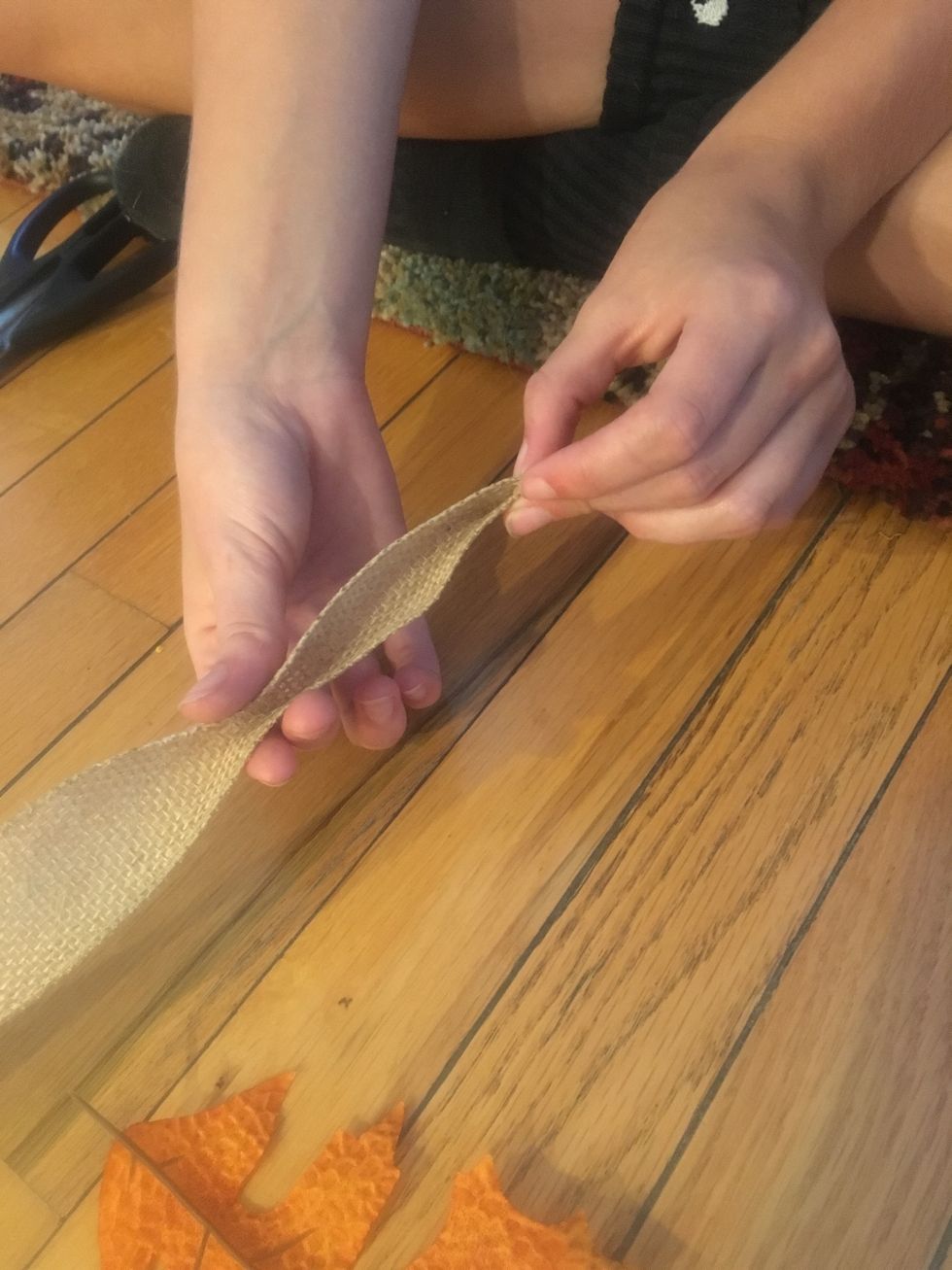 Optional: if the ribbon is thicker fold the ribbon in half to create a crease