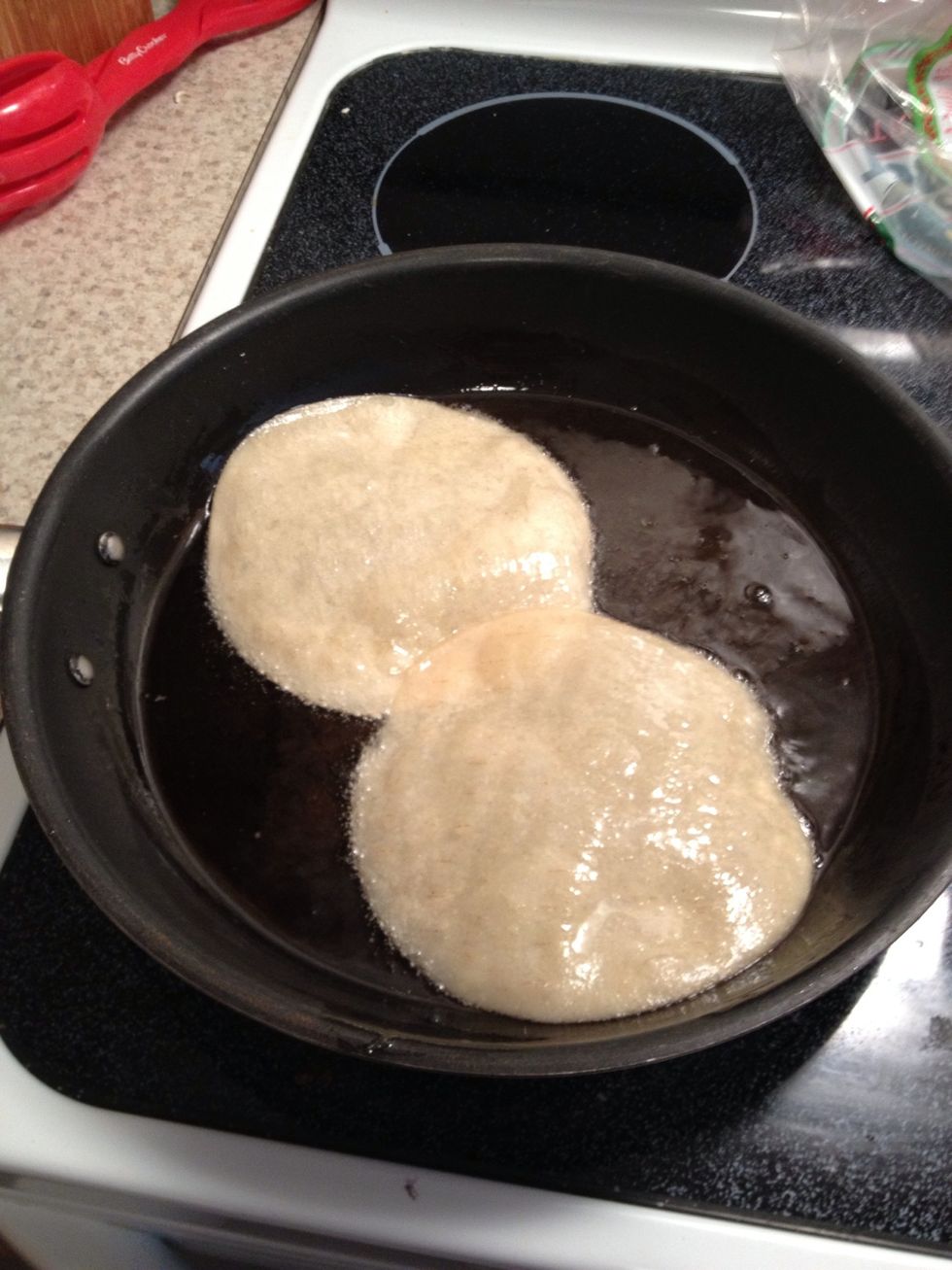 (Optional) In a shallow pan of the cooking oil of your choice start to lightly fry your tortillas so that your casserole has some "structure" to it.