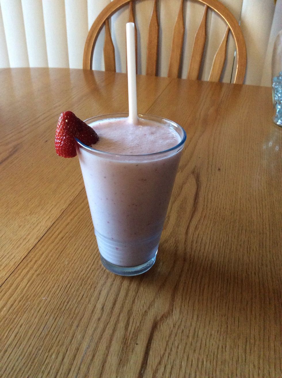 (Optional) Place a sliced strawberry on your cup and add a straw. Enjoy!