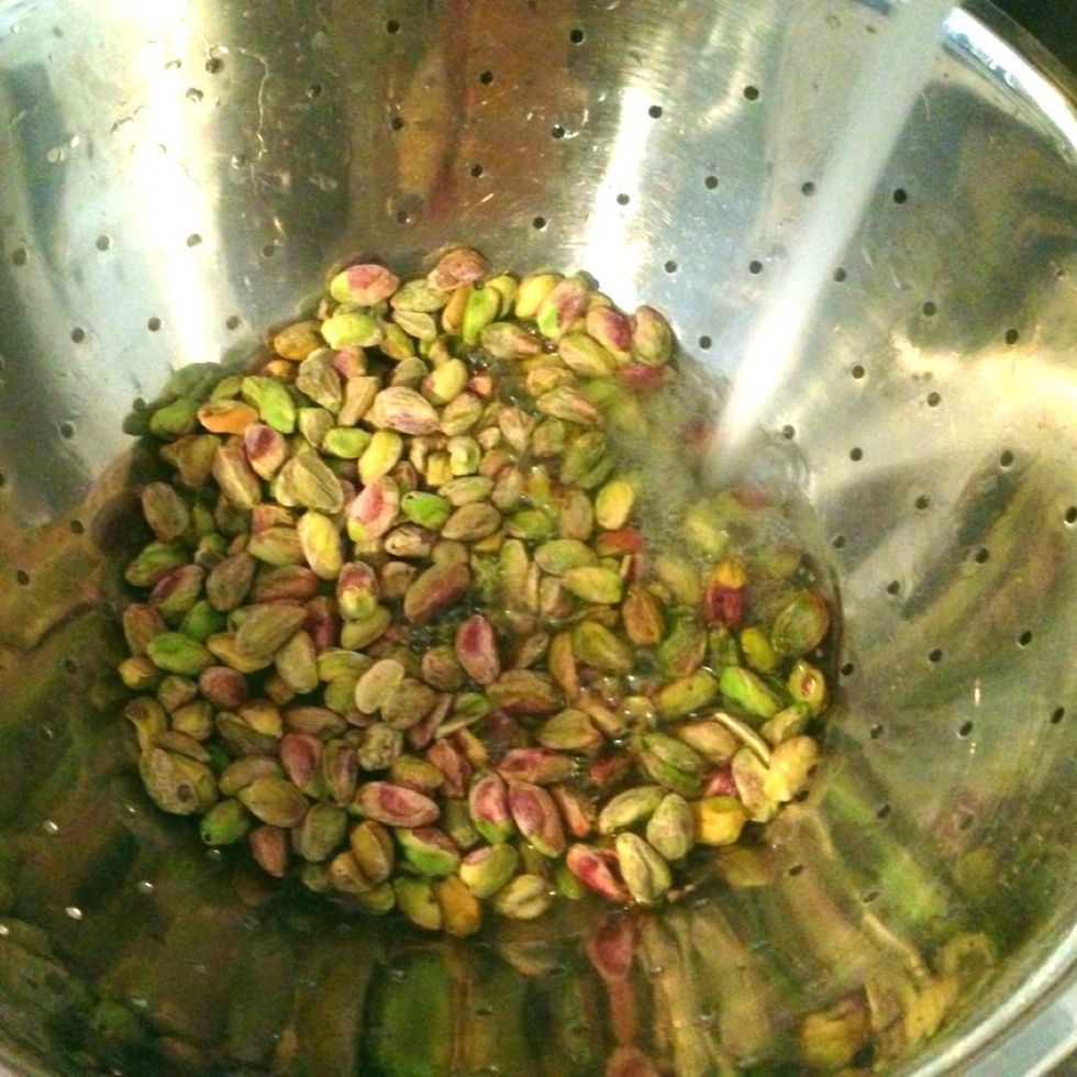 OPTIONAL: Place pistachios in the strainer and rinse salt off. If you prefer your pistachio butter to be saltier, skip ahead to step 4.
