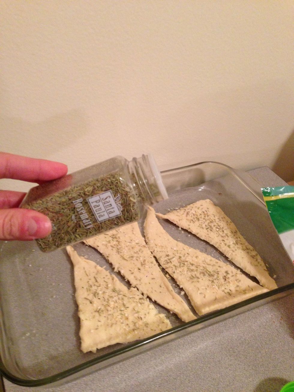 (Optional) Sprinkle desired amount of rosemary. After cooking, I realized it would have tasted better without since I used butter crescent rolls.