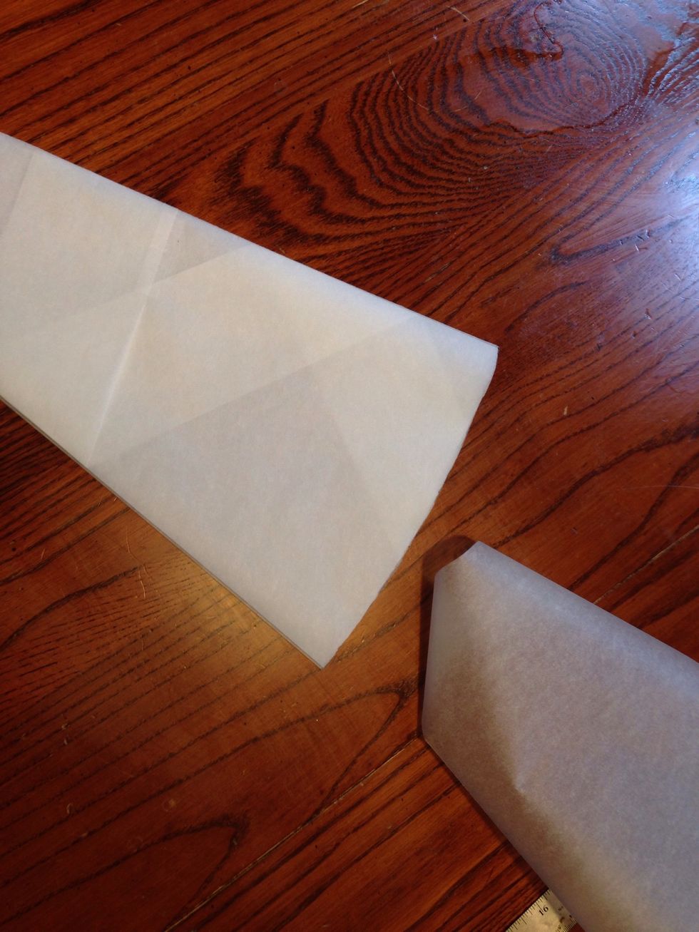 Optional step. Flip the pattern over and fold the other side in half.