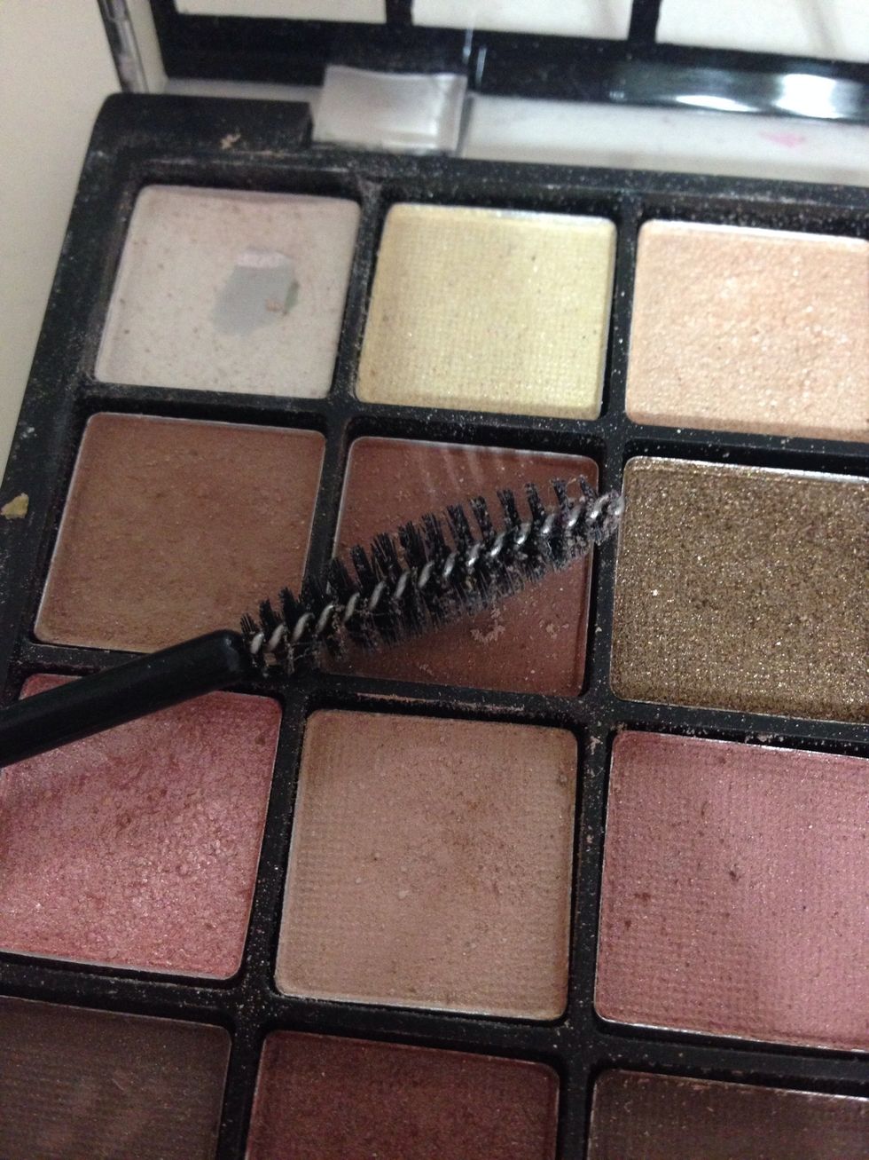 OPTIONAL: take a spooly brush and swirl it in eye shadow that matches your hair and fill in your brows