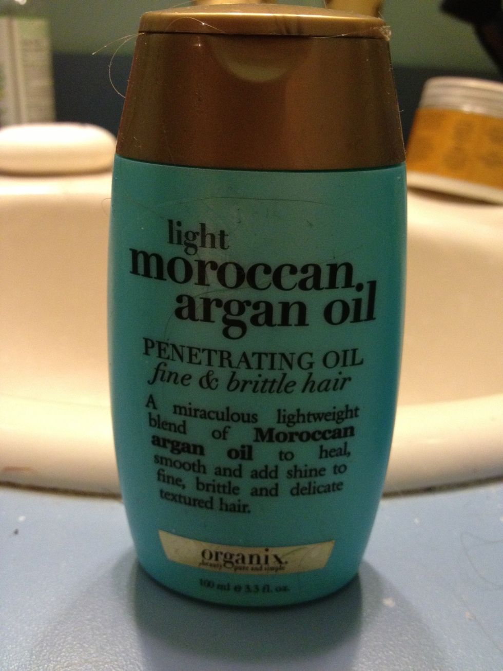 Optional. Tiny bit of this stuff in hands warm it in your palms the add to the ends of your hair.