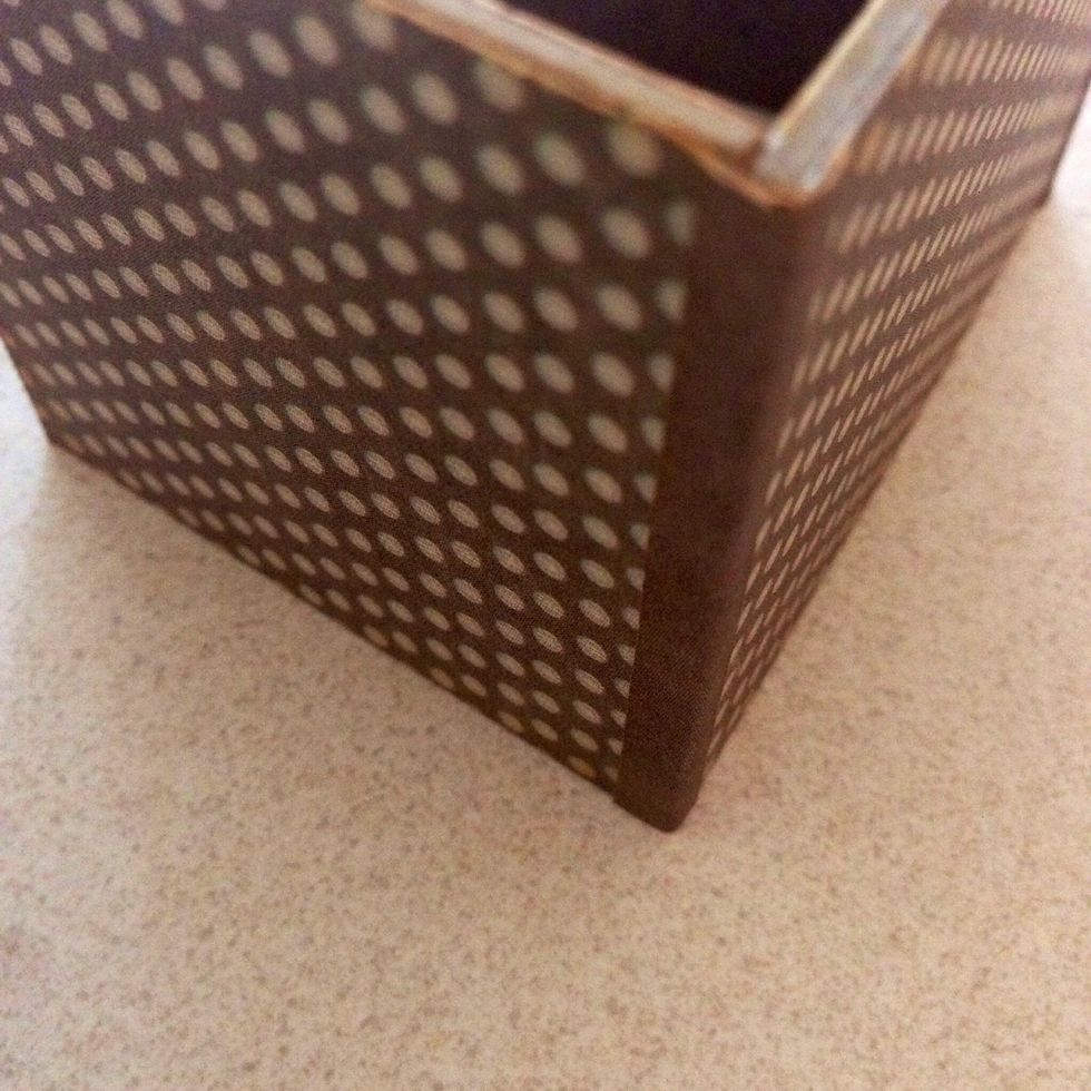 Optional: To conceal the gaps between the corners of the holder, glue a small strip of pattern paper over it...