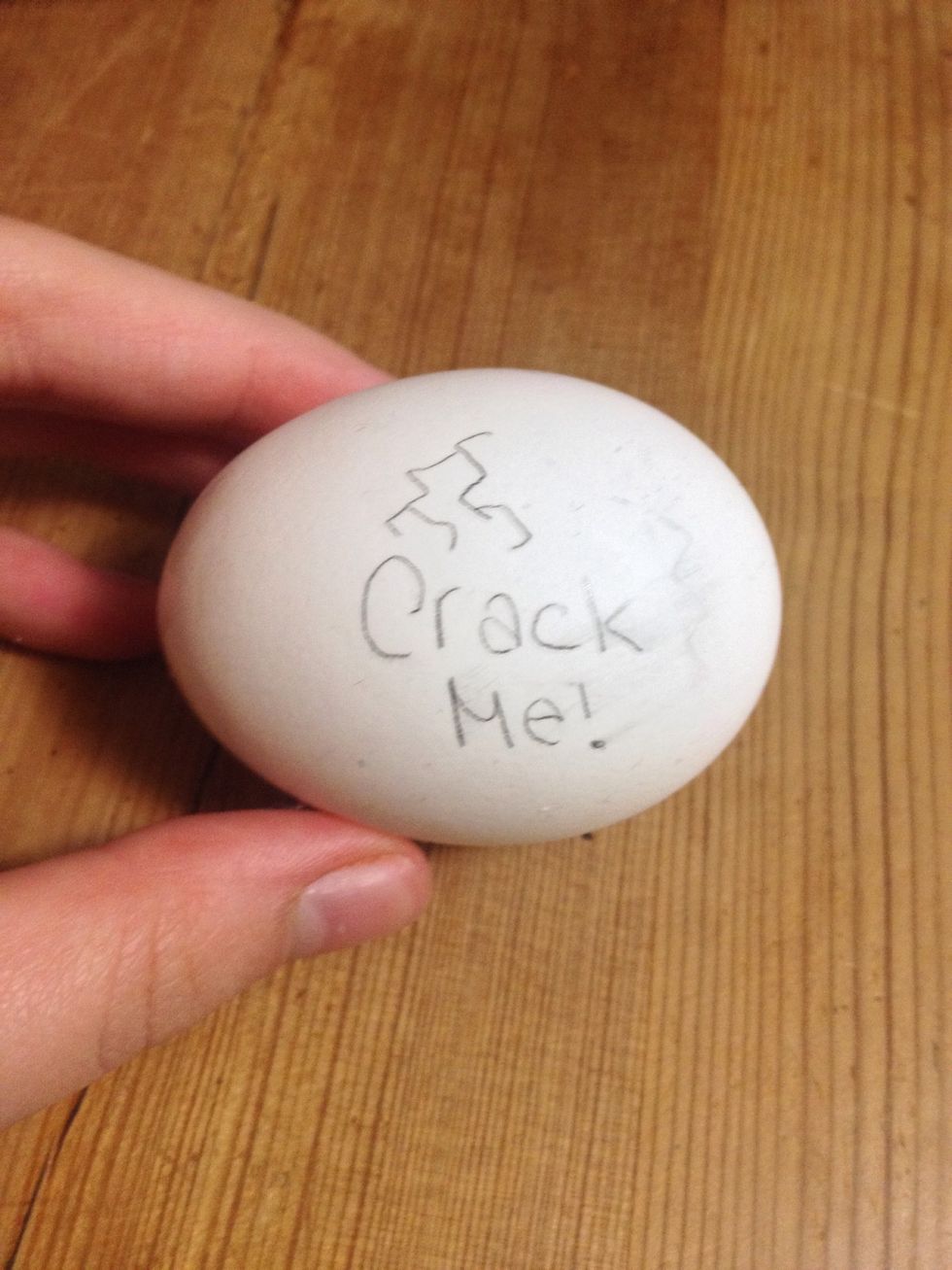 OPTIONAL: Write "crack me" on the egg!