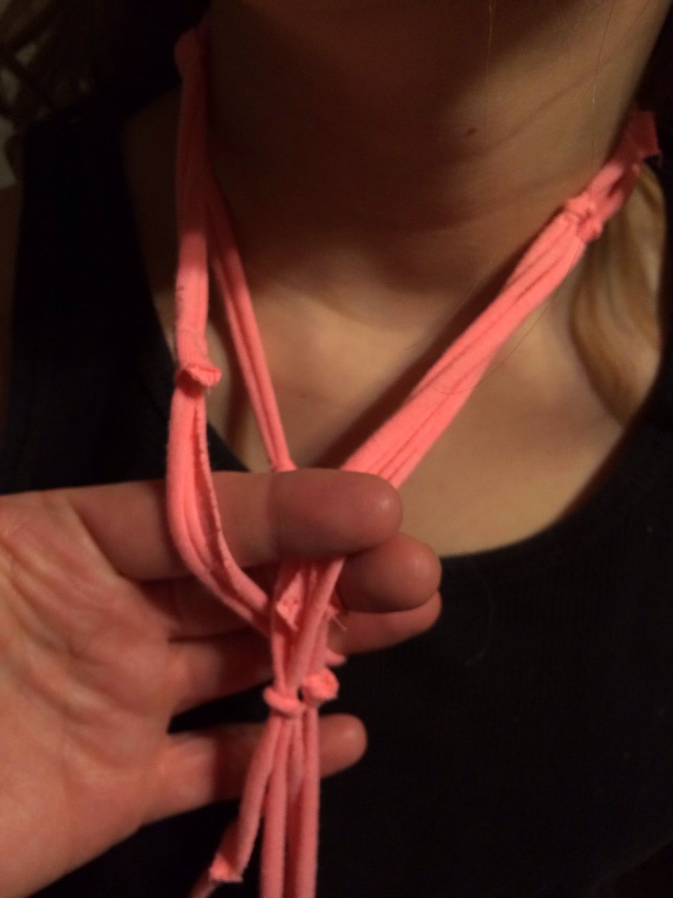Or fix the looped end all the way up to the neck.