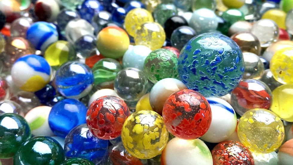 Or how would you organize these marbles by color and size?