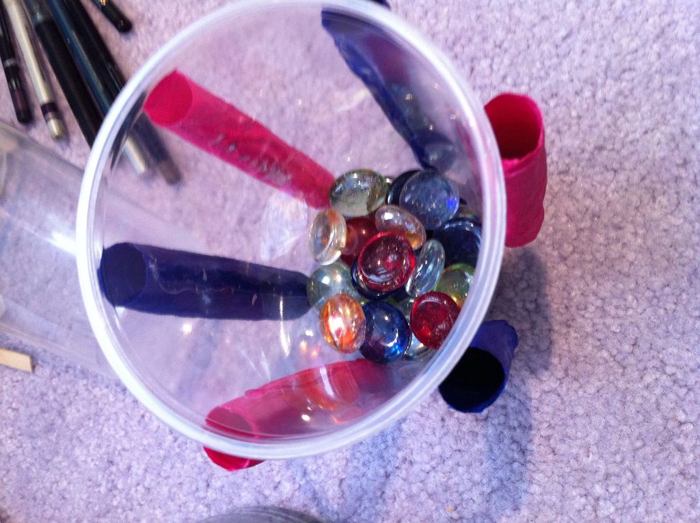 Or some marbles (one dollar at the dollar store)