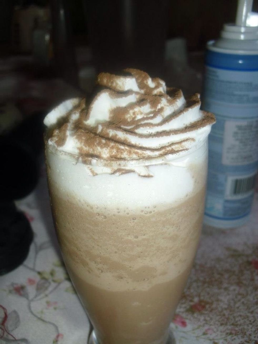 Or spread the cacao powder on the top of the whipped cream .